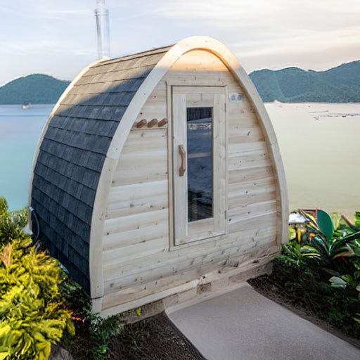 outdoor barrel sauna in ocean background