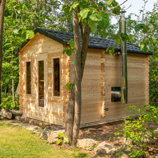 outdoor barrel sauna outside at woods