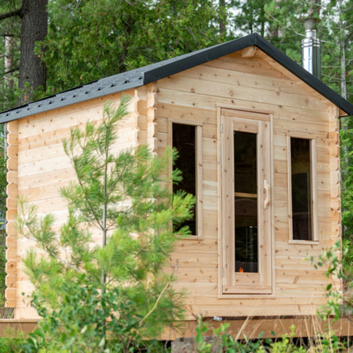 sauna outdoor barrel with grass at front